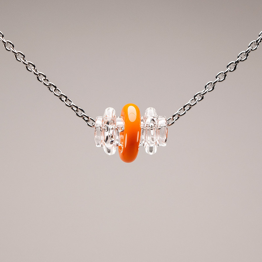 Kinetic Glass Bead with Orange Rotating Ring