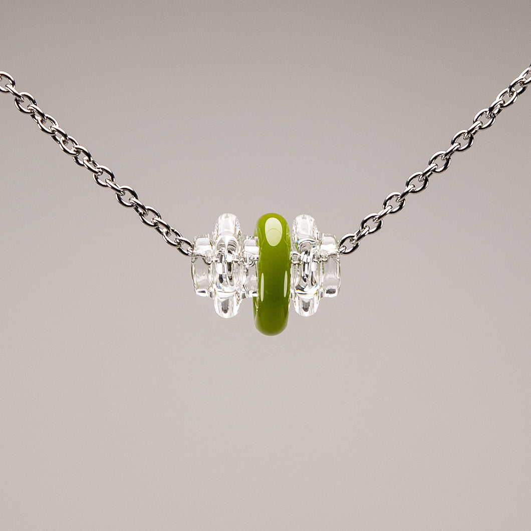 Kinetic Glass Bead with Green Rotating Ring